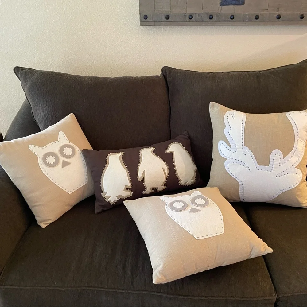 Like new WEST ELM winter owl reindeer penguin appliqué set of 4 linen pillows